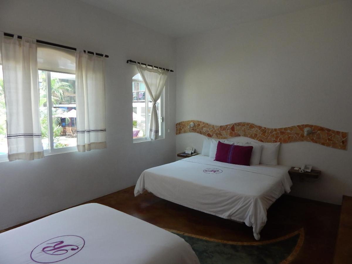 Hotel Rockaway ปูแอร์โตเอสกอนดิโด ภายนอก รูปภาพ